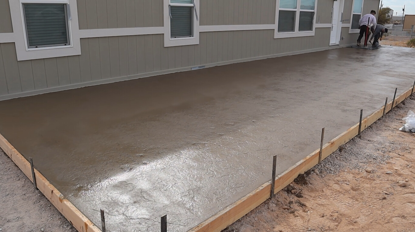 Fresh concrete foundation pour with professional finish