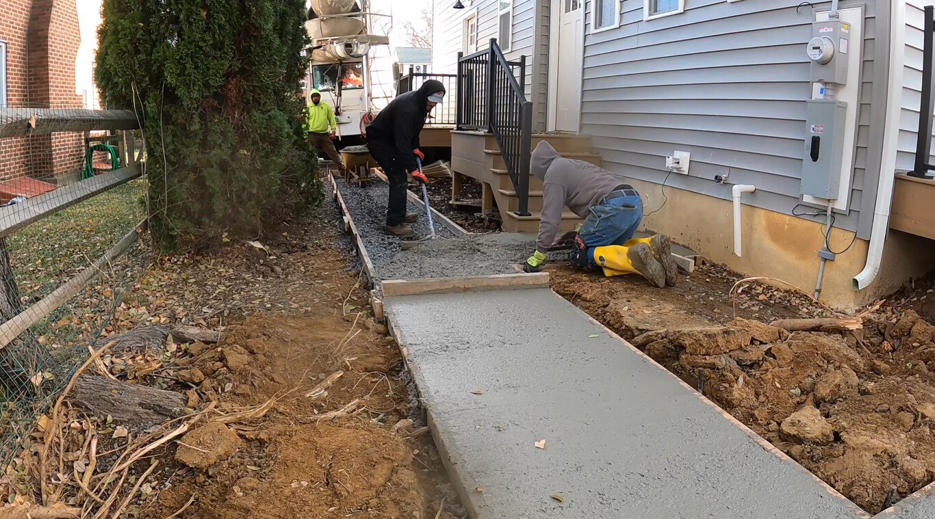 Concrete sidewalk and walkway installation by professional contractors